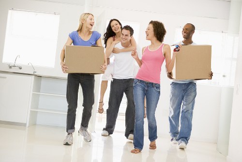 Loading furniture and boxes into a van for an Edgware collection