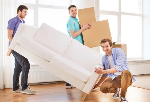 Packed boxes and furniture ready for local removals