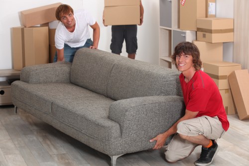 Furniture being loaded into a removals van for an Edgware home move