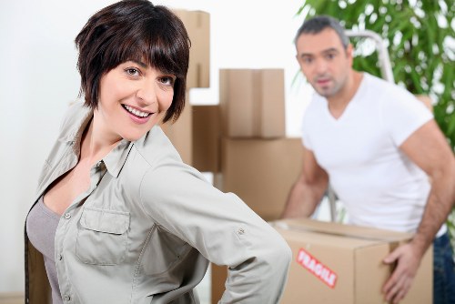 Packed office boxes and equipment ready for relocation in Edgware