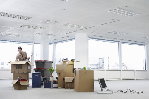 Professional movers handling furniture during a residential relocation in Edgware