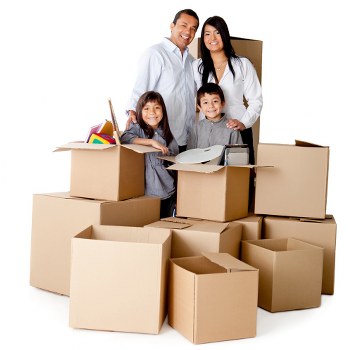 Team moving office furniture through a commercial building